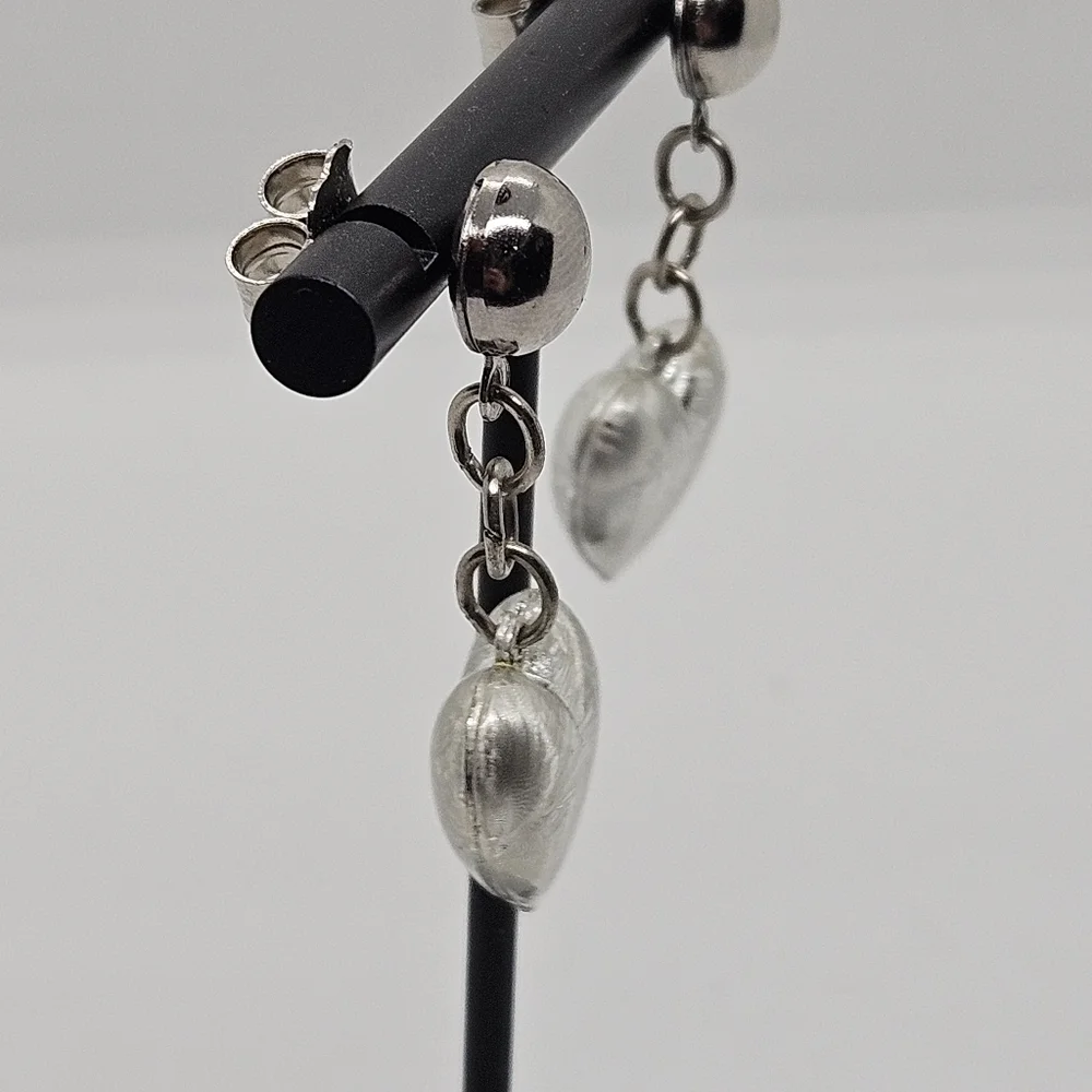 brushed silver tone heart dangle earrings